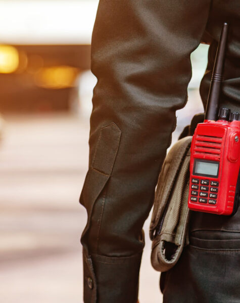 Security,Guard,Uses,Radio,Communication,For,Facilitate,Traffic.,Traffic,Officers